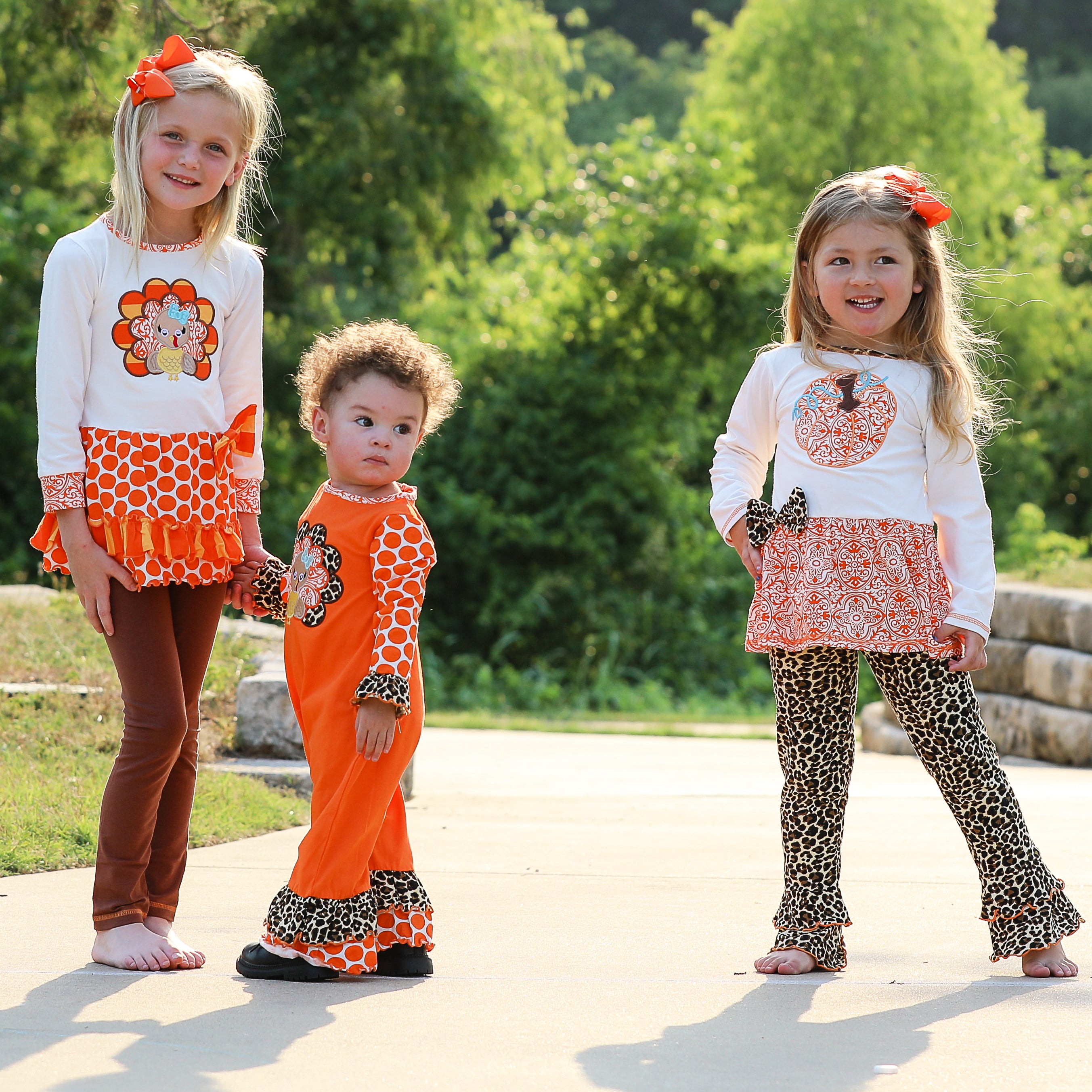 AnnLoren Big Little Girls Autumn Turkey Tunic & Leggings featuring a turkey applique, cream tunic, and orange knit leggings.